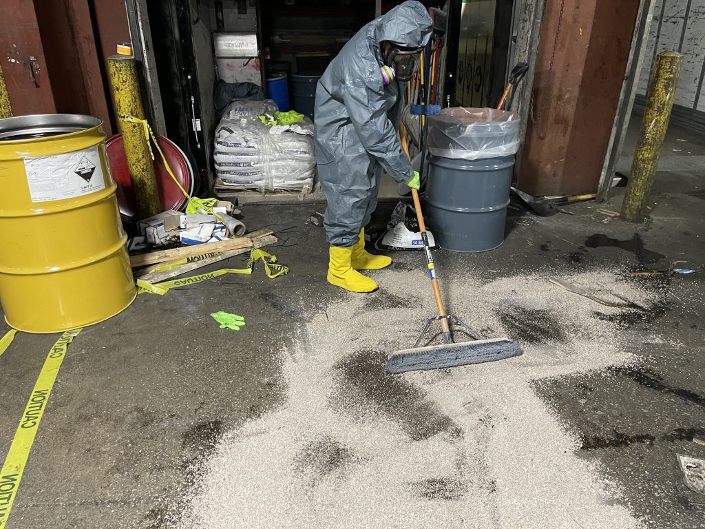 emergency dock spill with corrosive liquid leak